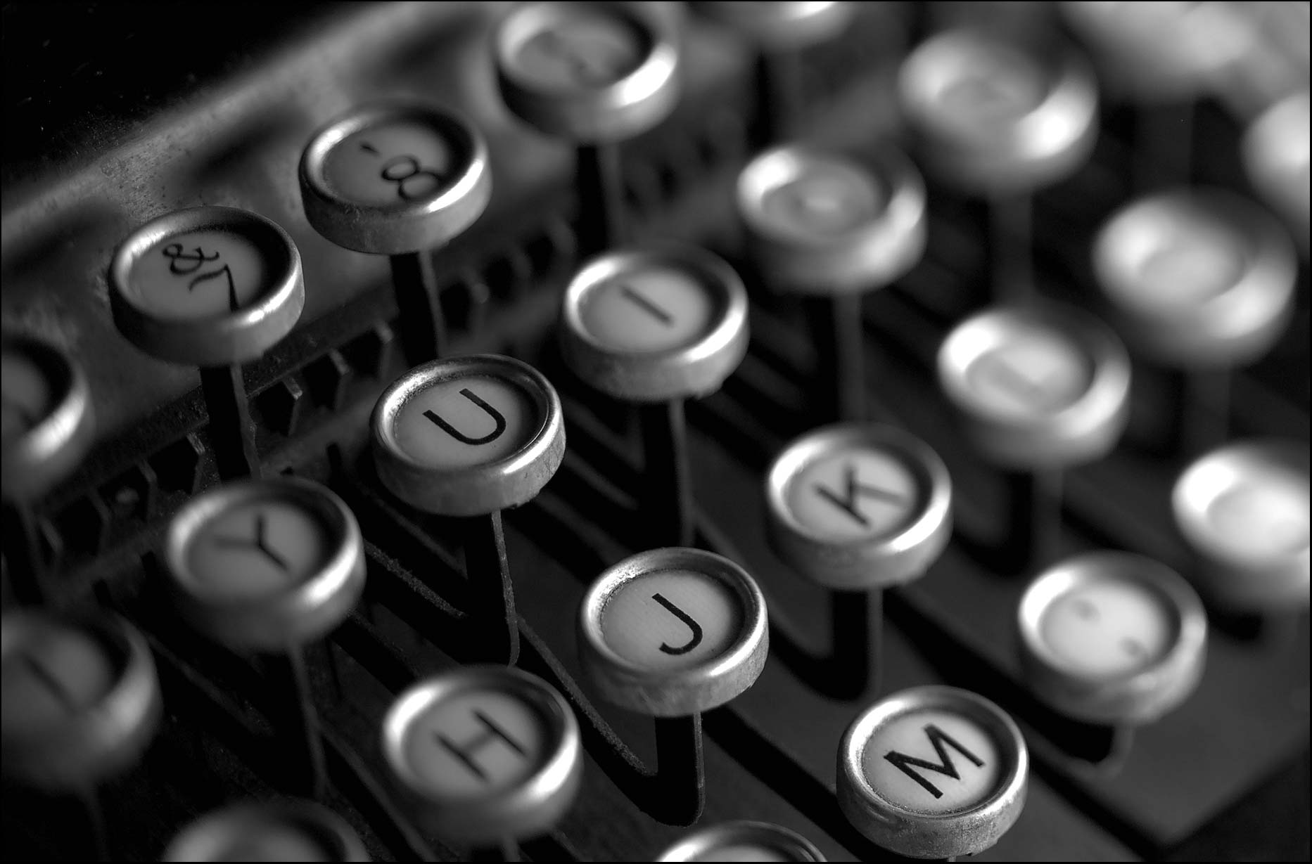 Black and White image of typewriter keys