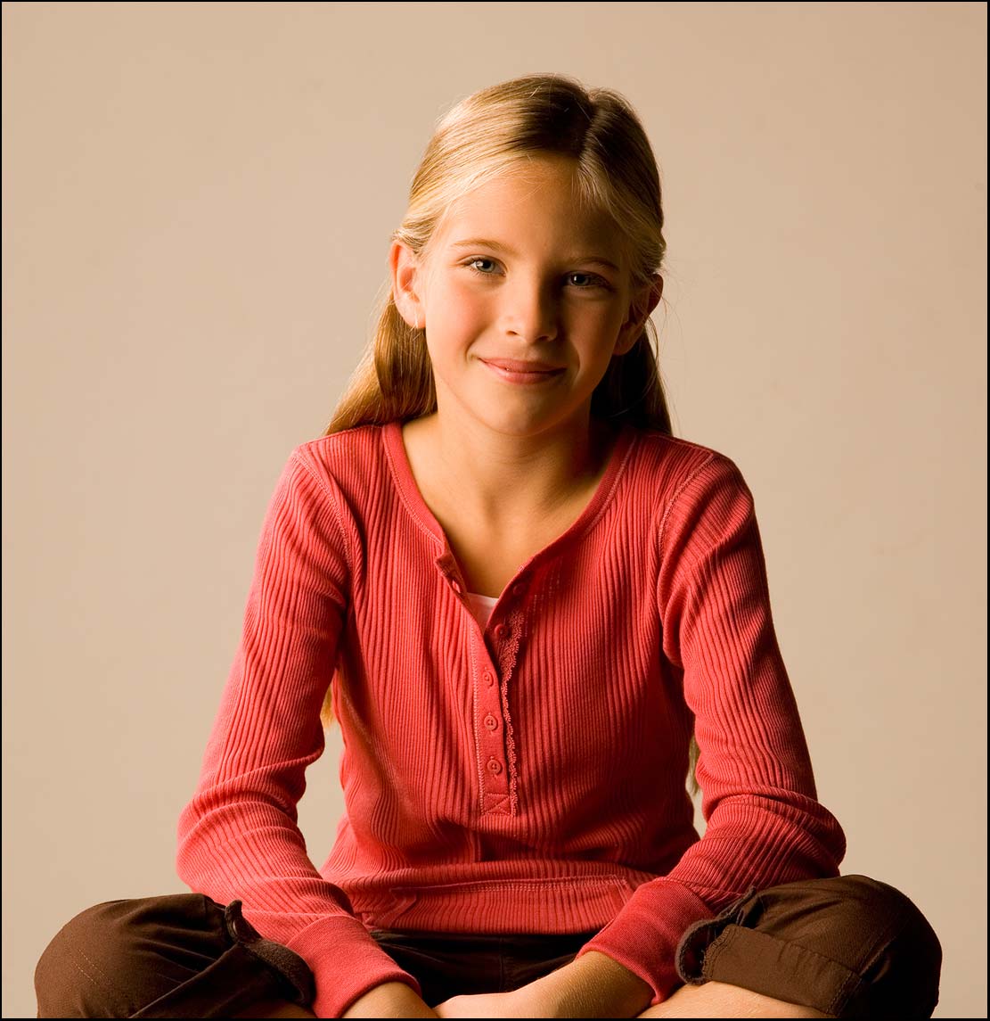 Young Girl sitting in the studio