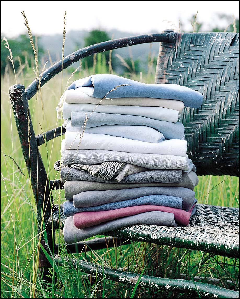 Stack of Shirts shot in a field 